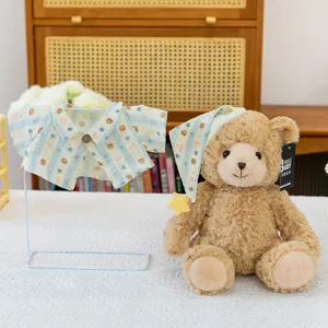 Cute plush teddy bear toy set with matching mini pajamas and sleep cap, cozy home decor detail.