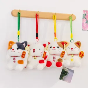 Cute lucky cat plush pendant detail view, soft stuffed animal doll charm for bags or desktop decor.