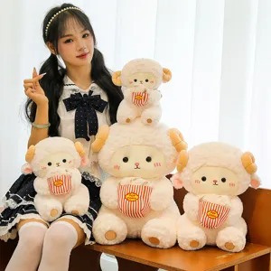 Close-up detail of cute fluffy lamb plush toys holding popcorn buckets, soft bedroom decor item.