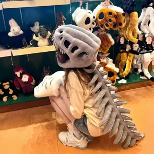Plush dinosaur skeleton headwear and spine tail costume, fun Halloween cosplay hat.