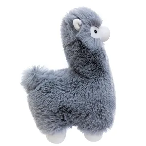 Detail shot of the fluffy grey alpaca plush toy showcasing soft texture and cute white face features.