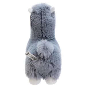 Close-up back detail of the soft gray plush alpaca toy, showing fluffy fur texture.