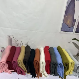 Solid color plush tassel scarf for women and men, soft winter warm knitted neck wrap.