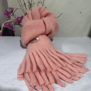 Pink plush tassel scarf for women, soft warm winter knit neck wrap for cold weather details.