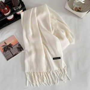 White cashmere feel winter tassel scarf for men and women, cozy warm shawl, detail view.