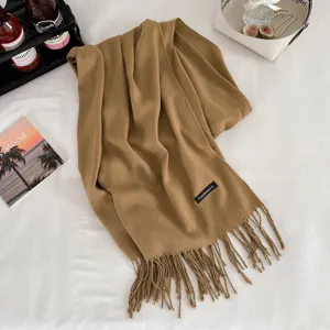 Winter warm imitation cashmere scarf for men and women, classic tassel design, stylish and cozy.