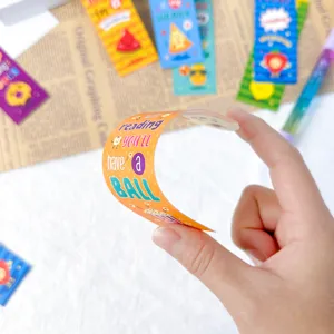 Detailed view of cute cartoon paper bookmarks for kids, featuring colorful food designs.