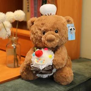 Cute chef teddy bear plush toy holding a sweet cake, soft stuffed doll for birthday gift.