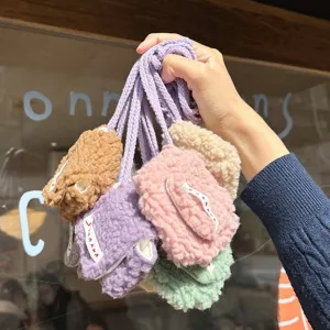 Plush mini AirPods pouch, cute fluffy hanging neck earphone storage bag with flap closure.
