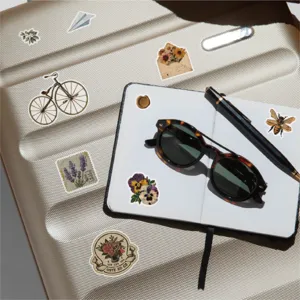 Vintage aesthetic decorative stickers detail view featuring botanical and travel lifestyle elements.
