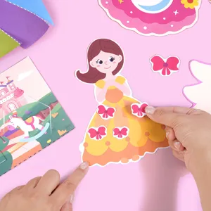 Detail view of kids paper cutting craft book set, featuring princess dress up game parts.