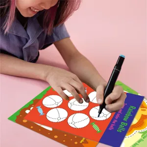 Kids pen control tracing book detail showing child practicing line drawing with marker.