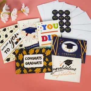 Graduation greeting cards set with white envelopes and seals for celebration party.