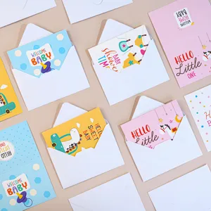 Baby shower greeting cards featuring cute newborn illustrations and white envelopes set.
