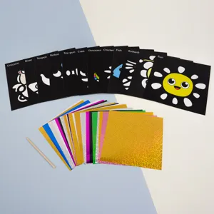 Children magic scratch art craft detail showing colorful foil sheets and black templates with stick.