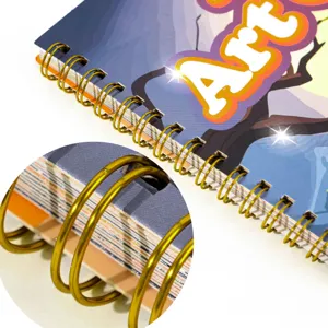 Close-up detail of the colorful foil art kit showing golden spiral binding and cover design.