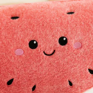 Cute watermelon plush pillow detail view, soft furry fabric with embroidered lovely smile face.
