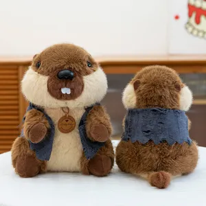 Detailed view of the cute marmot plush toy featuring a dark vest and hanging round tag.