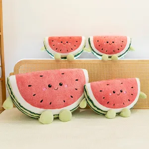 Detailed scene view of cute watermelon plush toys arranged neatly on a cozy bed headboard.