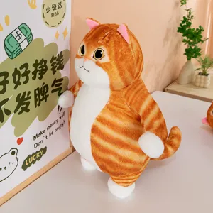 Cute fat orange cat plush toy detail, soft stuffed animal doll decoration, lovely desk companion.