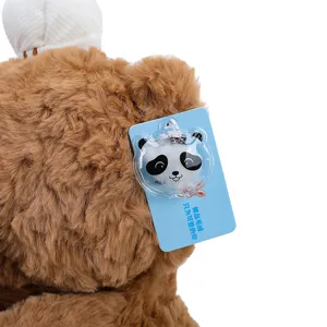 Brown plush teddy bear chef doll detail shot, soft stuffed animal toy for birthday gift and kids.