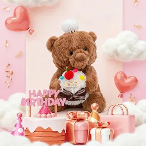 Close-up detail of cute brown teddy bear plush holding cake with birthday party theme.