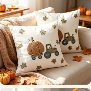 Autumn pumpkin truck embroidered cushion cover detail showcasing cozy vintage sofa decor.