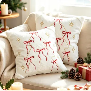 Detailed view of white plush Christmas pillowcase featuring embroidered red bows and gold stars.