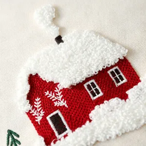 Christmas red house embroidered pillow cover, soft plush snow design for sofa decor.