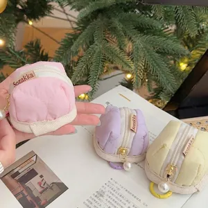 Joli étui de protection matelassé pour AirPods avec fermeture éclair et perle.