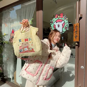 Cream quilted tote bag with cute bear embroidery and large capacity for casual daily shopping.