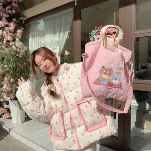 Pink quilted tote bag detail featuring cute bear embroidery and large capacity for daily use.
