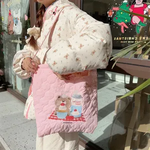 Quilted embroidered tote bag large capacity canvas crossbody bag for casual daily use and shopping.