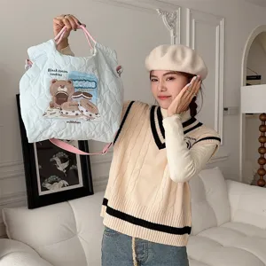 Light blue quilted tote bag with cute bear embroidery, perfect for autumn winter casual style.