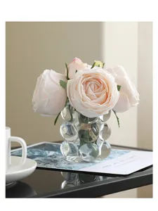 Luxury artificial rose flower bouquet with clear glass bubble vase for modern home decor.