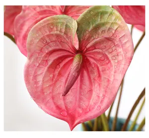 Artificial anthurium flower detail close up, realistic faux flamingo flower for interior decor.