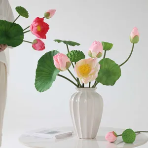 High-end artificial lotus flowers with ceramic vase for home wedding decor and photo props.