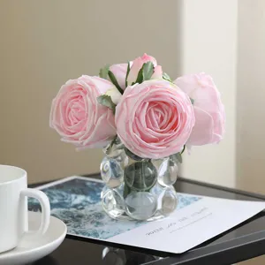 High-end artificial rose flower bouquet with bubble glass vase for home desktop decor.