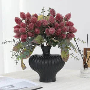 Artificial banksia flower arrangement in modern black vase home decor vintage wedding photo prop