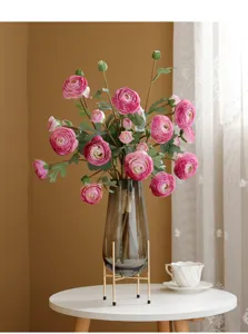 Artificial ranunculus flower bouquet with glass vase for elegant home decor and tabletop styling.