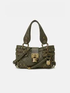 Sac à bandoulière de moto vintage élégant avec doubles serrures et clous pour femmes.