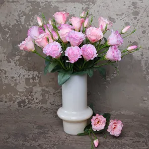 Artificial lisianthus flower bouquet in white ceramic vase for home wedding decor