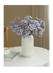 Artificial flower bouquet with white ceramic vase, perfect for home tabletop decor.