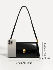 Classic black patent leather underarm shoulder bag featuring a stylish metal lock closure.