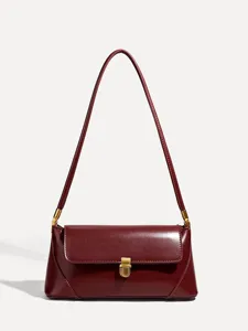 Elegant burgundy faux leather shoulder bag featuring a sleek metallic clasp for women's daily wear.