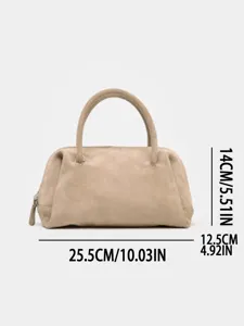 Sac bowling en suédine kaki, sac à main compact avec poignées et fermeture zippée chic.