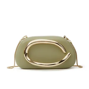 Olive green mini box crossbody bag with statement metallic C hardware and chain strap.