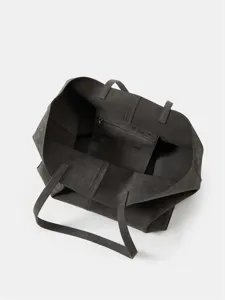Detailed top view of the dark grey large capacity tote bag interior with a secure zipper pocket.