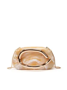 Close-up view of the marbled acrylic hard-shell clutch bag with polished metallic handle detail.