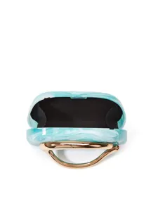 Close-up of blue marble resin evening clutch bag with elegant gold metal ring handle.